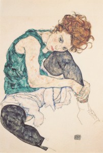 sitting-woman-with-legs-drawn-up